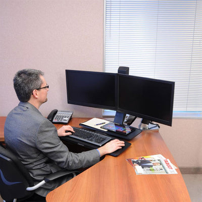 Ergotron Sit-Stand Desk Arm 24-316-026, seated person using a dual-monitor sit-stand workstation
