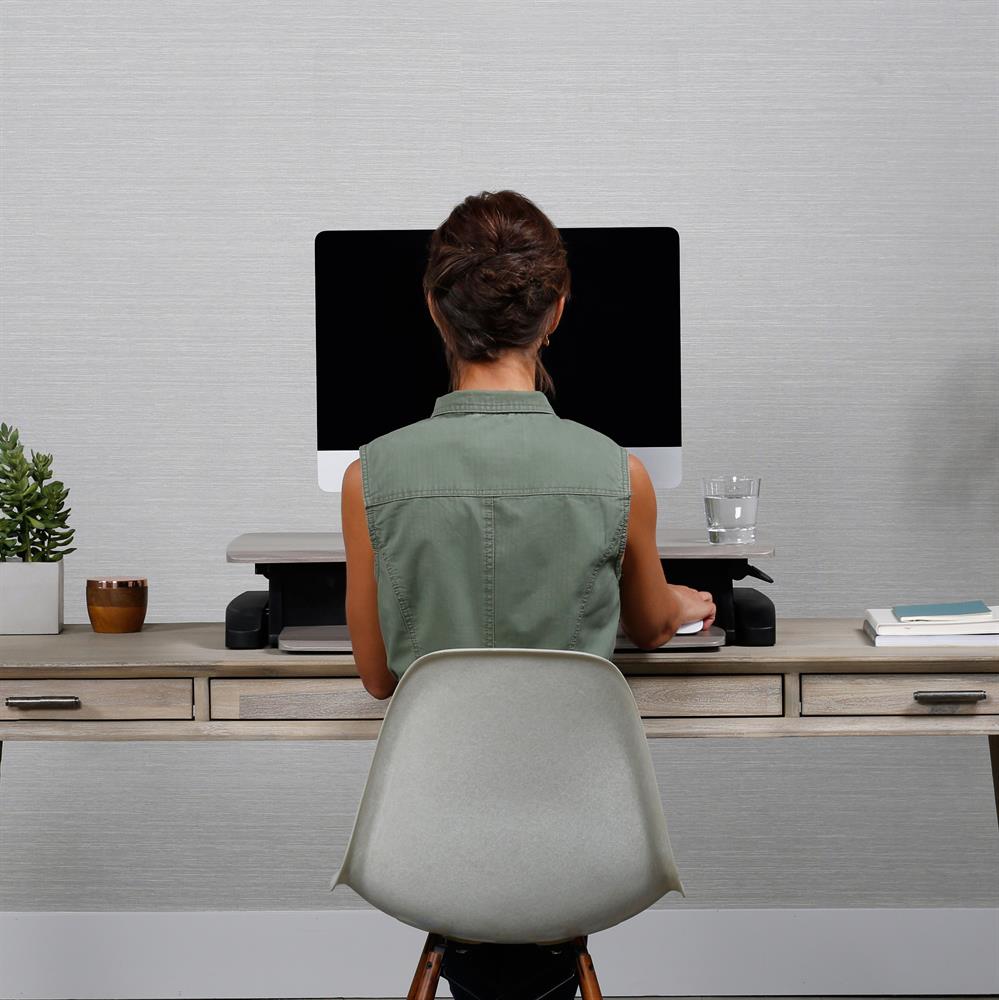 Ergotron Sit-Stand Desk Converter 33-458-917, sit-stand desk converter in seated use