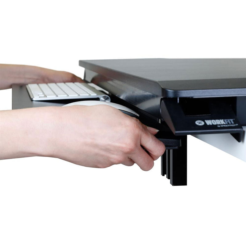 Ergotron Sit-Stand Desk Converter 33-467-921, height-adjustment handle in use