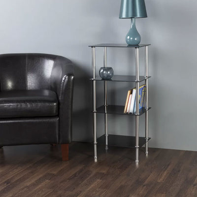 AVF Small Black Glass 4 Tier Shelving Unit S44-A, four-tier glass shelving unit staged beside a sofa