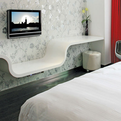B-Tech Small Ultra-Slim Fixed TV Wall Mount BT7510/B, compact television wall mount installed in a bedroom