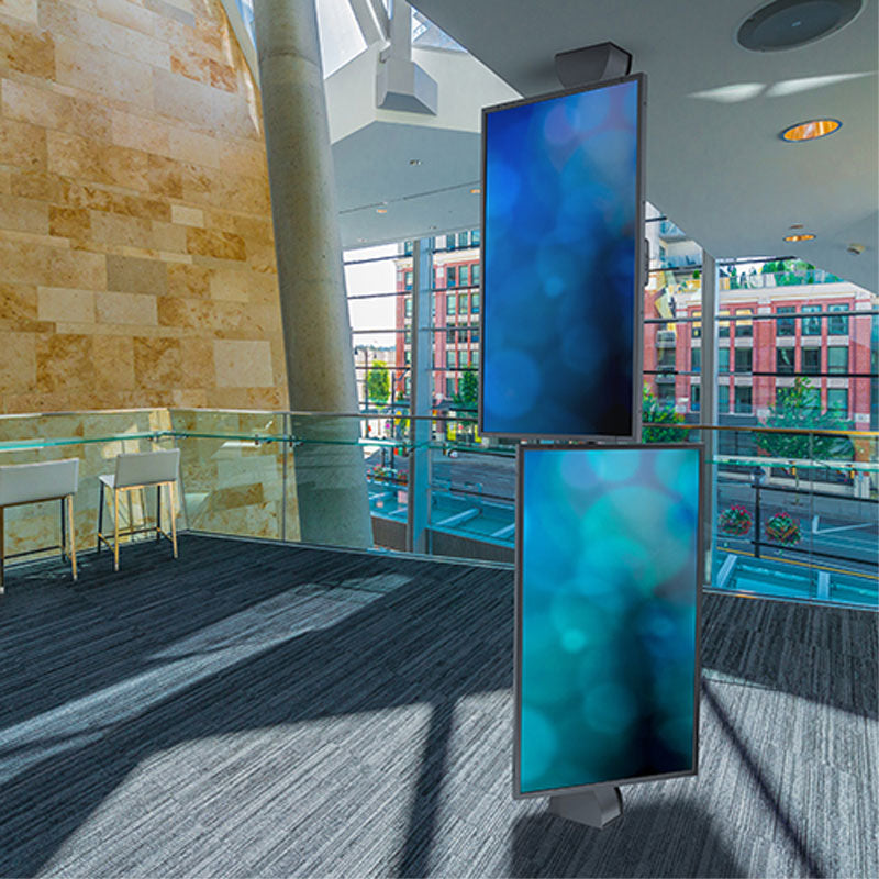 Chief Floor-to-Ceiling Clamp-Style Plate, CPA353, vertical displays installed building lobby view