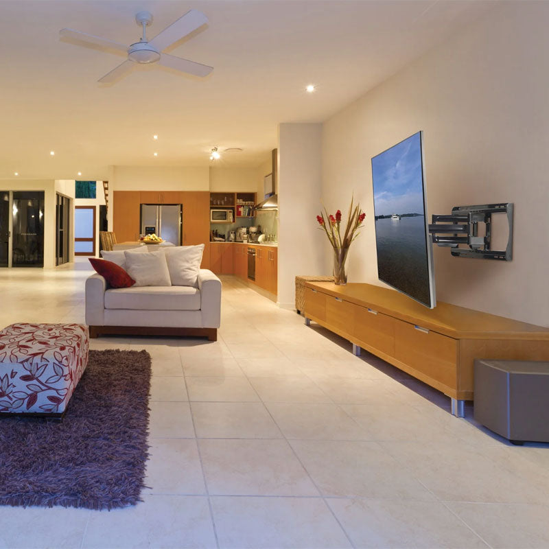 Peerless-AV PARAMOUNT XL Articulating TV Wall Mount PA762, full-motion display wall mount installed in living room