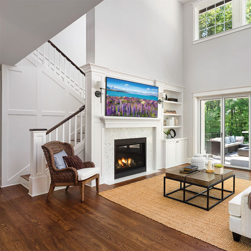 Peerless-AV Paramount XL Tilt TV Wall Mount PT670, wall-mounted TV installed above fireplace