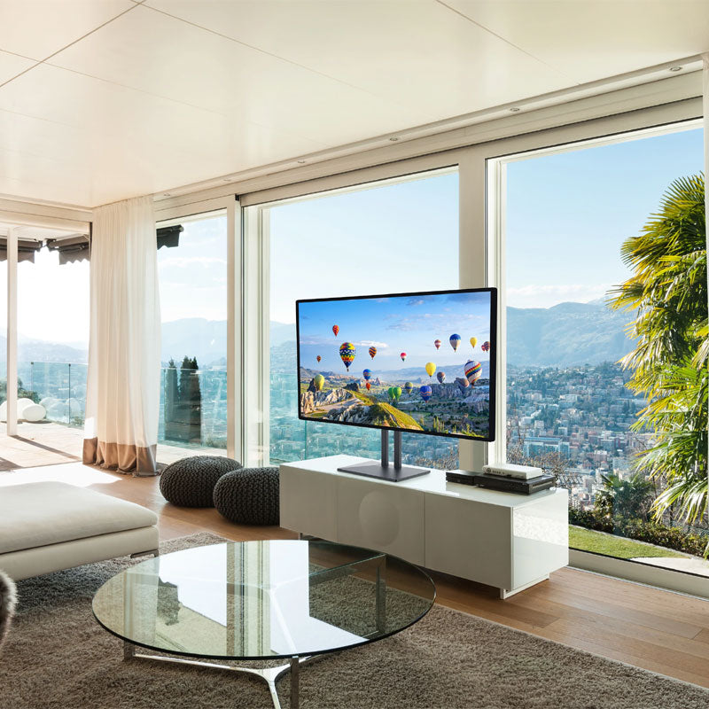 Peerless-AV Extra Large Table Top TV Stand PTS6X4, tabletop display stand installed in a modern living room