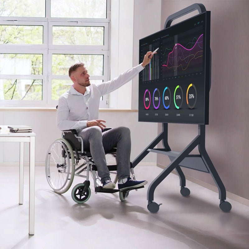 Peerless-AV SmartMount Extra Large Universal Flat Panel Cart SR898, wheelchair user presenting with mobile display