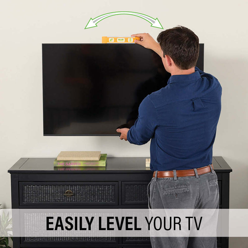 Sanus Small Adv Full-Motion 4D + Shift TV Mount VSF817-B2, person leveling a wall-mounted television