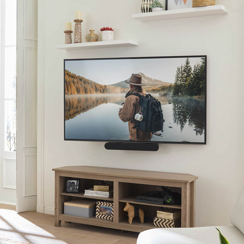 Sanus Soundbar TV Mount WSSAFM1-B2, wall-mounted TV and soundbar installed above a media console