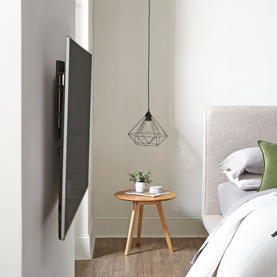 Sanus Medium Premium Full Motion TV Wall Mount VMF720-B2, wall-mounted TV retracted bedroom view