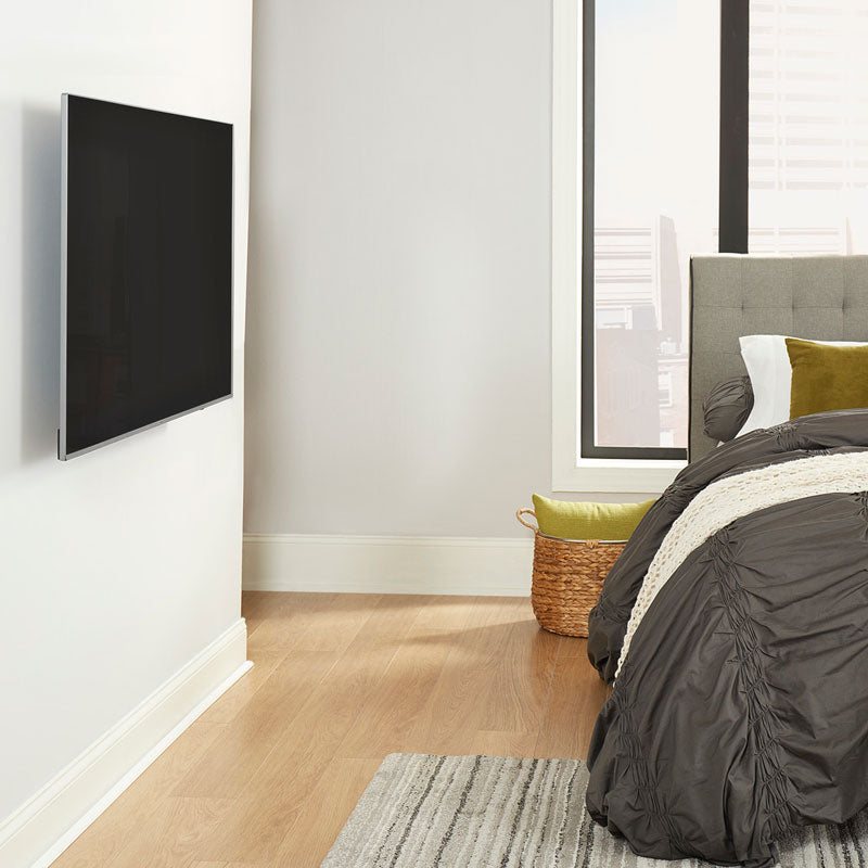 Sanus Medium Premium Full Motion TV Wall Mount VMF720-S2, wall-mounted TV retracted bedroom view