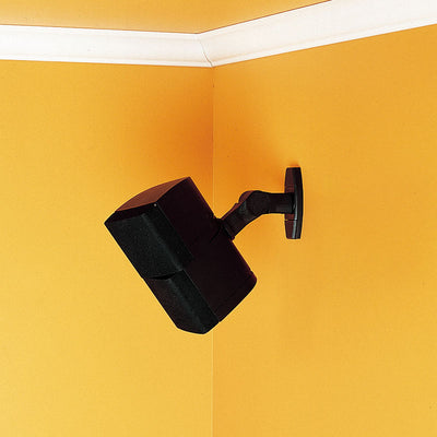 Sanus Satellite Speaker Wall Mounts WMS3B, speaker mounted high on a wall in a room corner
