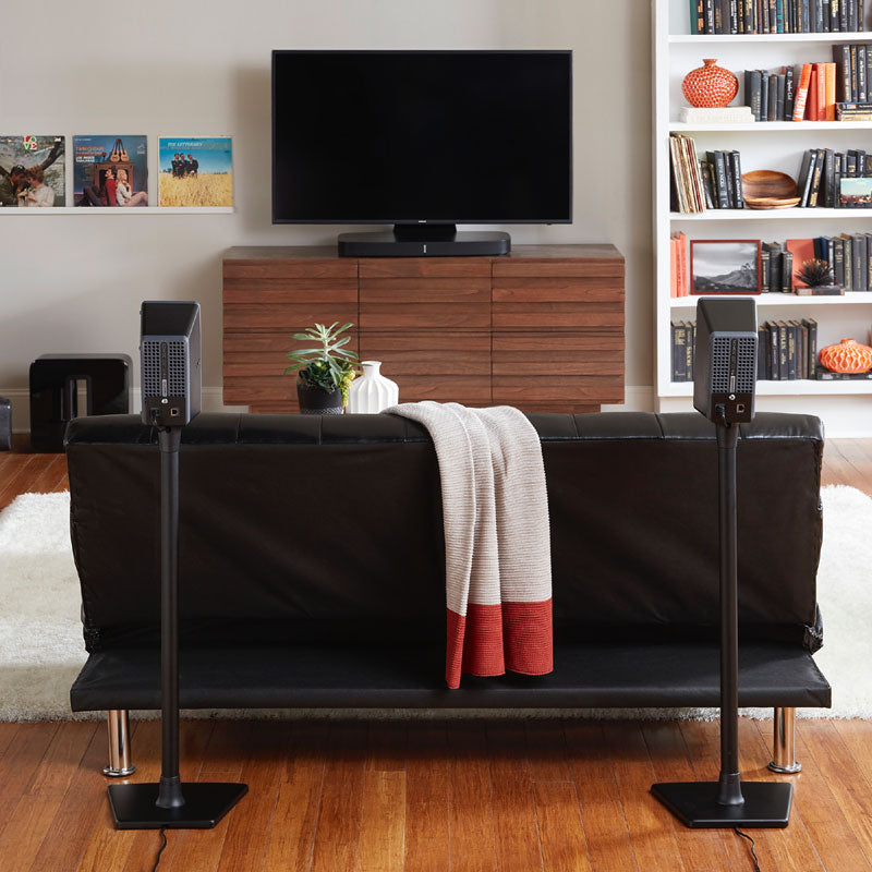Sanus Sonos Wireless Speaker Stands WSS22-B1, rear surround speaker stands in living room, angled back view