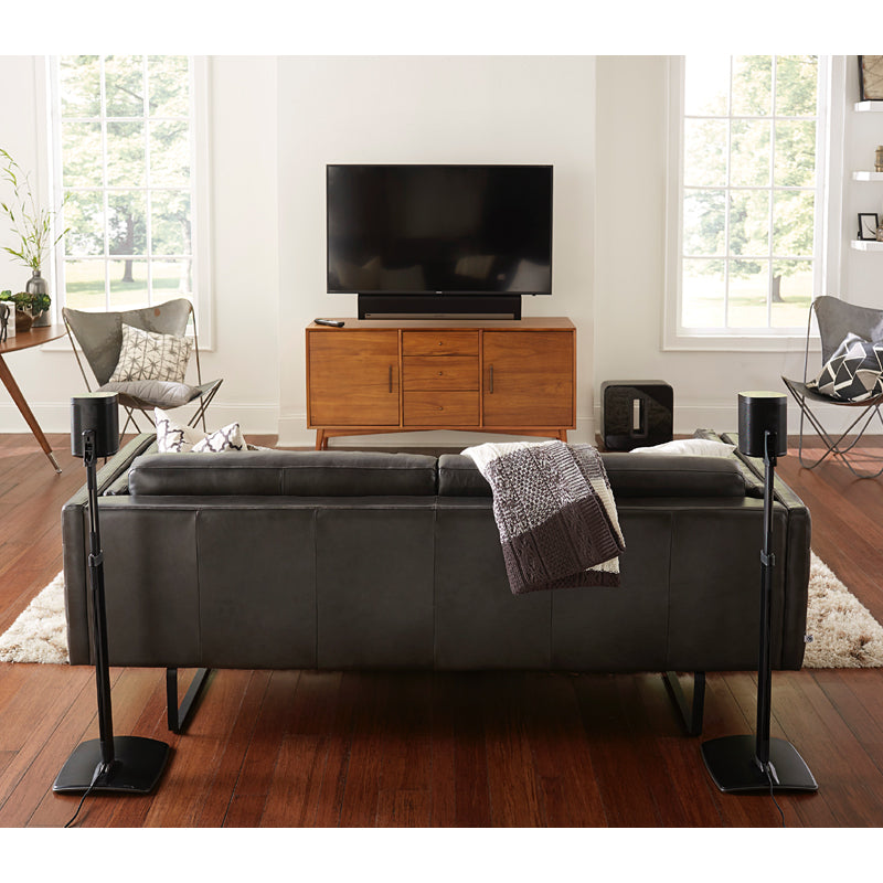 Sanus Sonos Wireless Speaker Stand WSSA2-B1, speakers on stands behind sofa facing outward