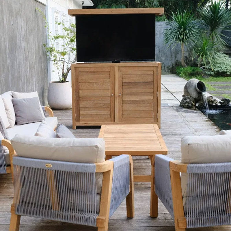 Touchstone TechTeak Outdoor Smart TV Lift Cabinet 70067, outdoor TV lift cabinet installed in a patio seating area