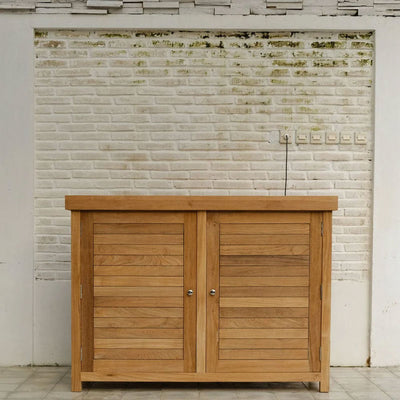 Touchstone TechTeak Outdoor Smart TV Lift Cabinet 70067, wood outdoor TV lift cabinet staged against a brick wall