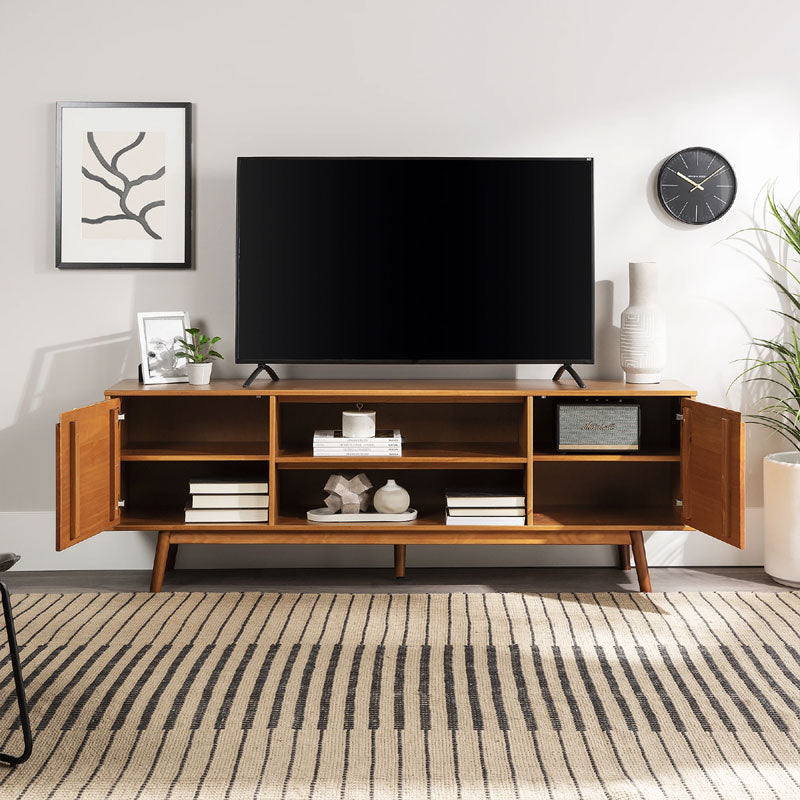 Walker Edison Adair 70 in. Modern 2 Door Solid Wood TV Stand W70ADR2DCA, wood media console with a television and doors open